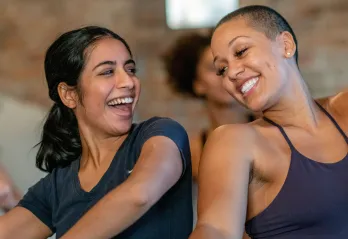 Women at the gym happy