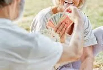 seniors playing cards