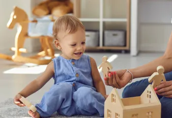 Young Child Playing with Toys