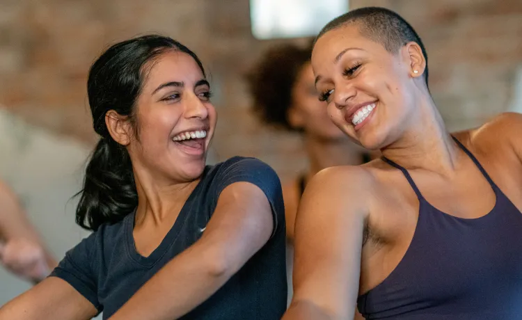 Women at the gym happy
