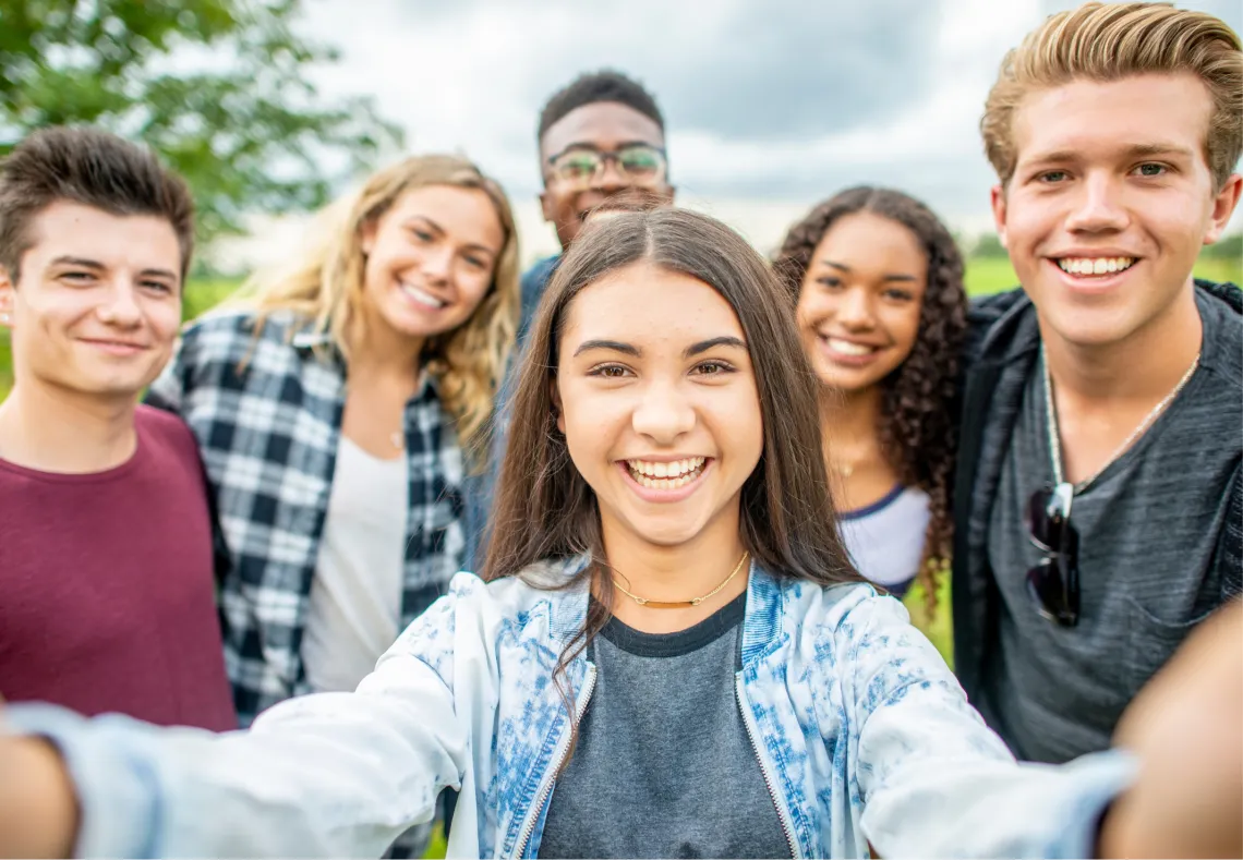 Group of teen taking photo